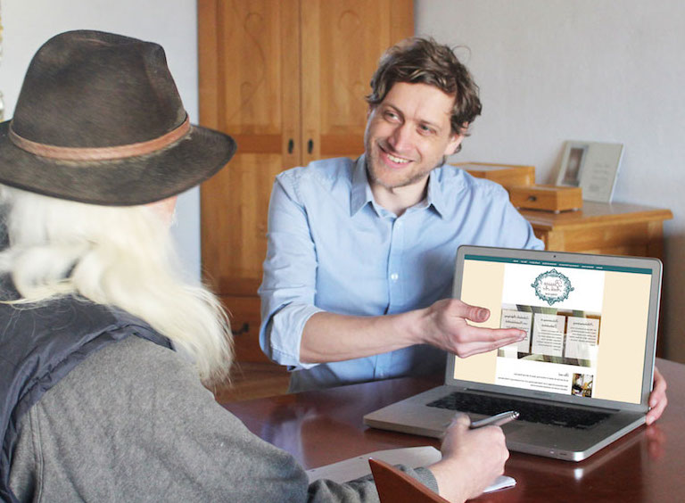 Stefan Ehrenfeld - Freelance Web Developer helping a client.